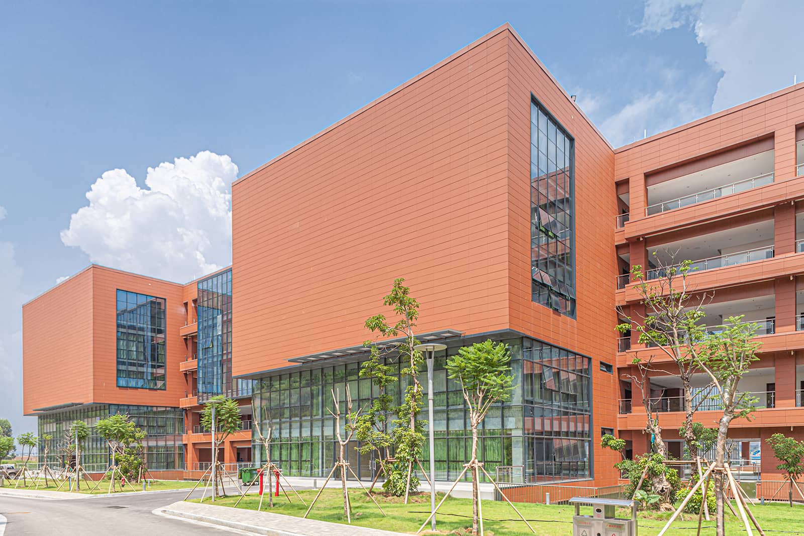 Terracotta facade wrap the the ground floor, top floor, back and corridors of laboratory building.jpg